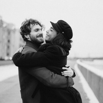 Monochrome Photo Of Woman Hugging Man